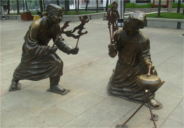 定做皮影戲雕塑.jpg 定做皮影戲雕塑.jpg