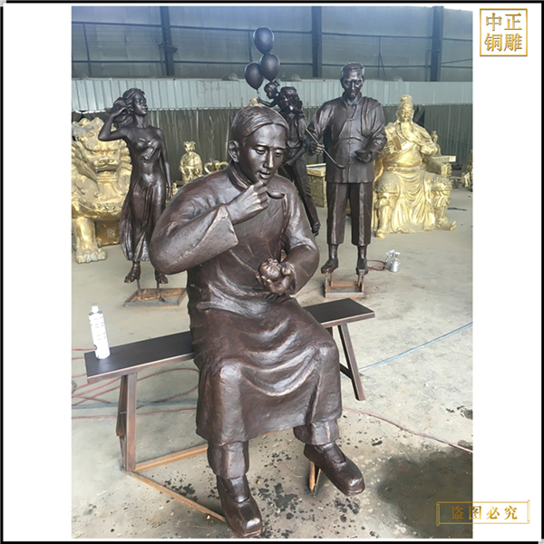 3吃包子人物銅雕塑.jpg 3吃包子人物銅雕塑.jpg