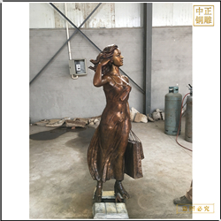 美女購(gòu)物銅雕塑