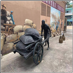 仿銅創(chuàng)意推車人物銅雕塑 仿銅創(chuàng)意推車人物銅雕塑